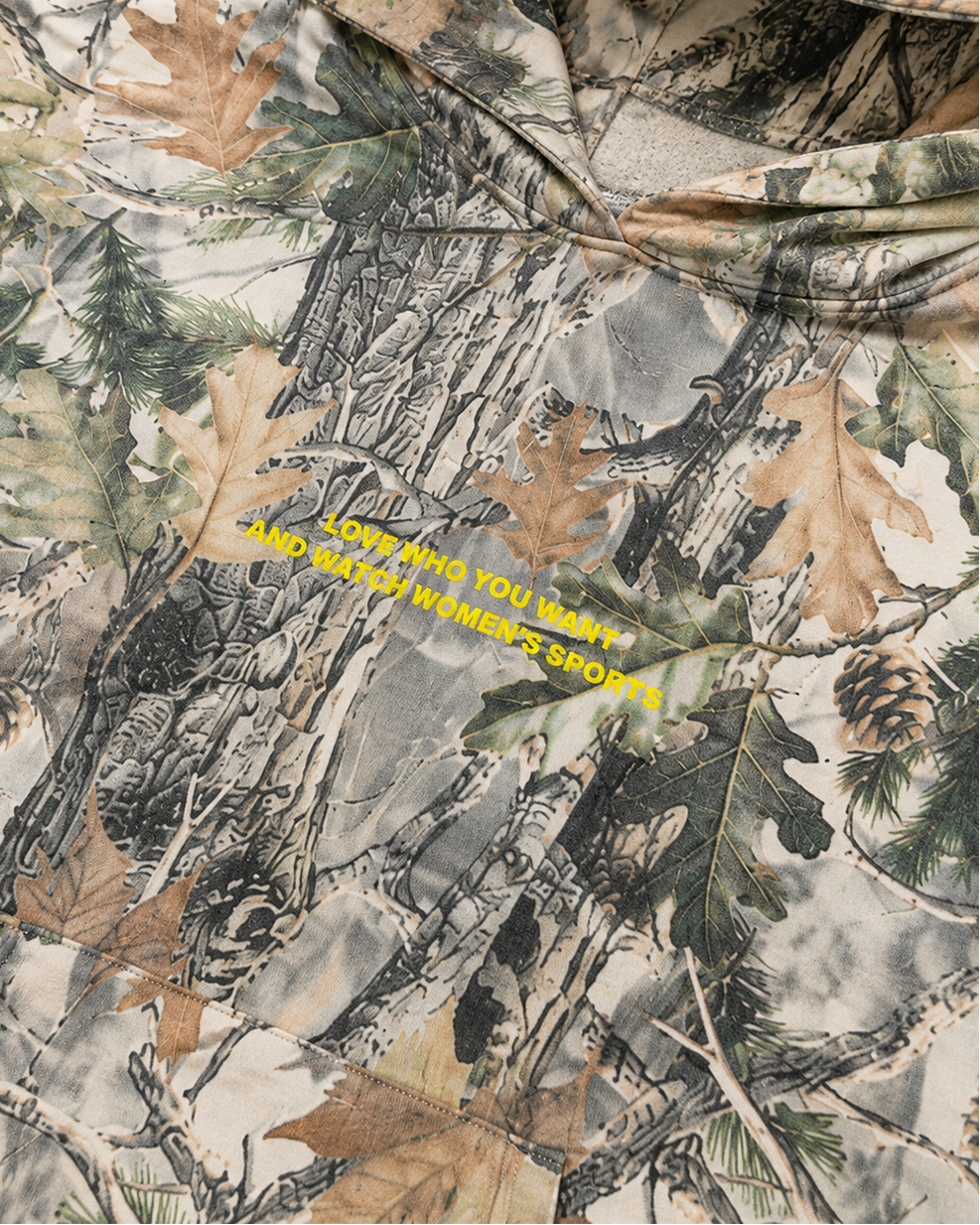 Camouflage-patterned shirt with text