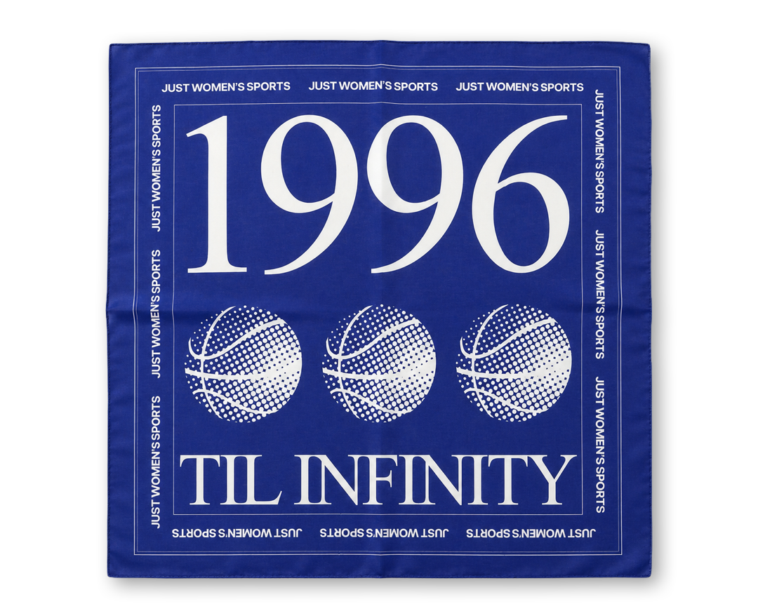 A blue bandana featuring a white graphic print with the text '1996', 'TIL INFINITY', three basketball illustrations, and 'JUST WOMEN'S SPORTS' repeated around the border.